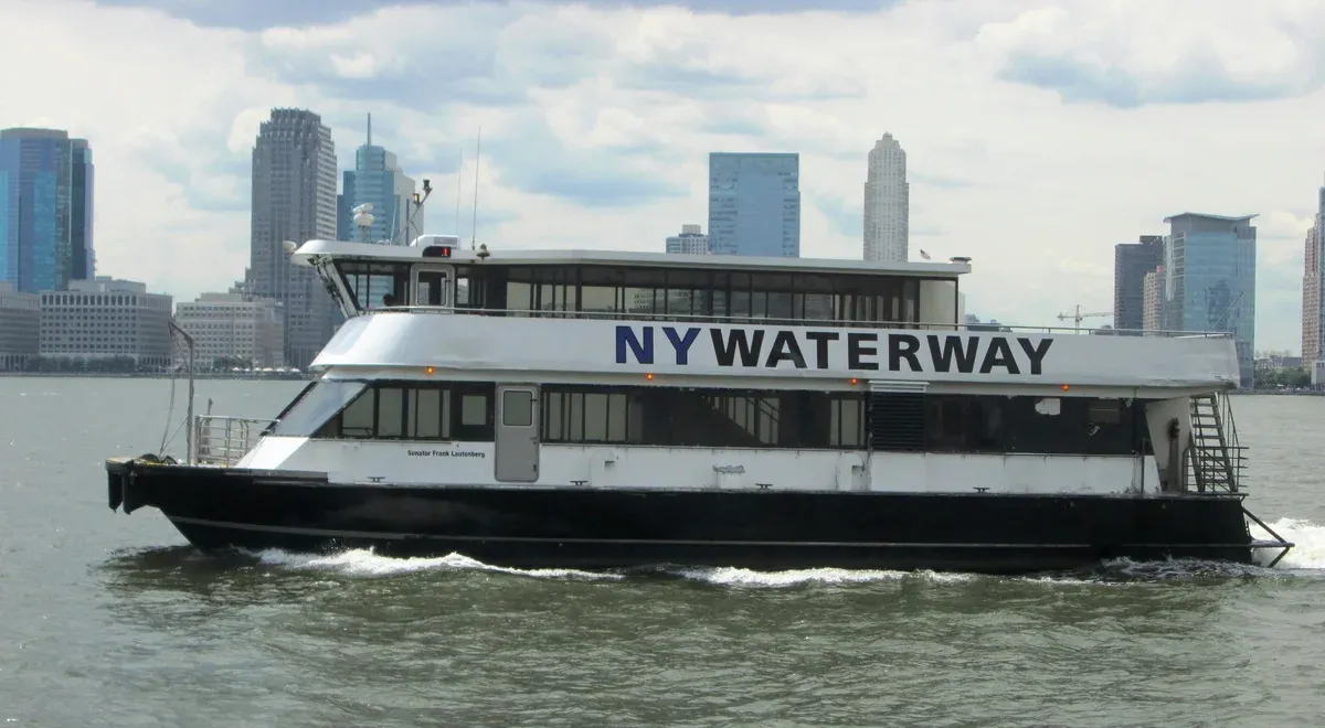 NY Waterway ferry on the Hudson with the Jersey City skyline, used on a New York architecture boat tour
